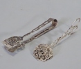 2 st. kaktänger, silver, 1900-tal