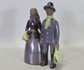 2 st. figuriner "Amerikafararna och Kringel-Stava, JIE keramik, 1900-talets andra hälft