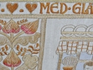 Broderad bonad "Med glättigt sinne i fredligt tjäll ......"