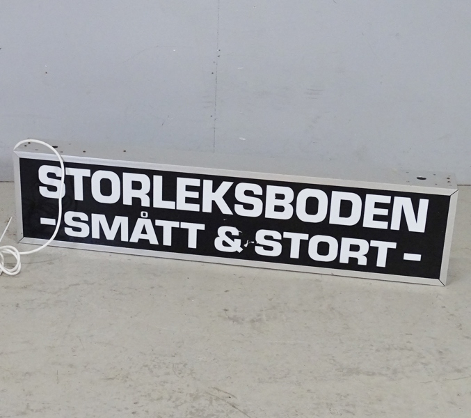 Ljusskylt "Storleksboden"
