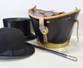 Stormhatt i hattask samt plommonstop och silverkrycka, 1900-talets första häft