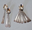 9 st. kaffeskedar samt 1 st. tesked, silver. GAB, 1960-tal